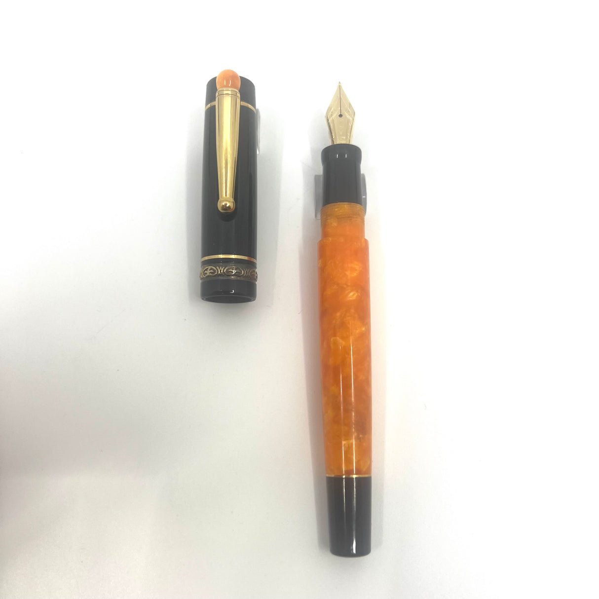 Delta Lucky Black/Orange Fountain Pen (aka WE)- Medium 14kt Gold Nib