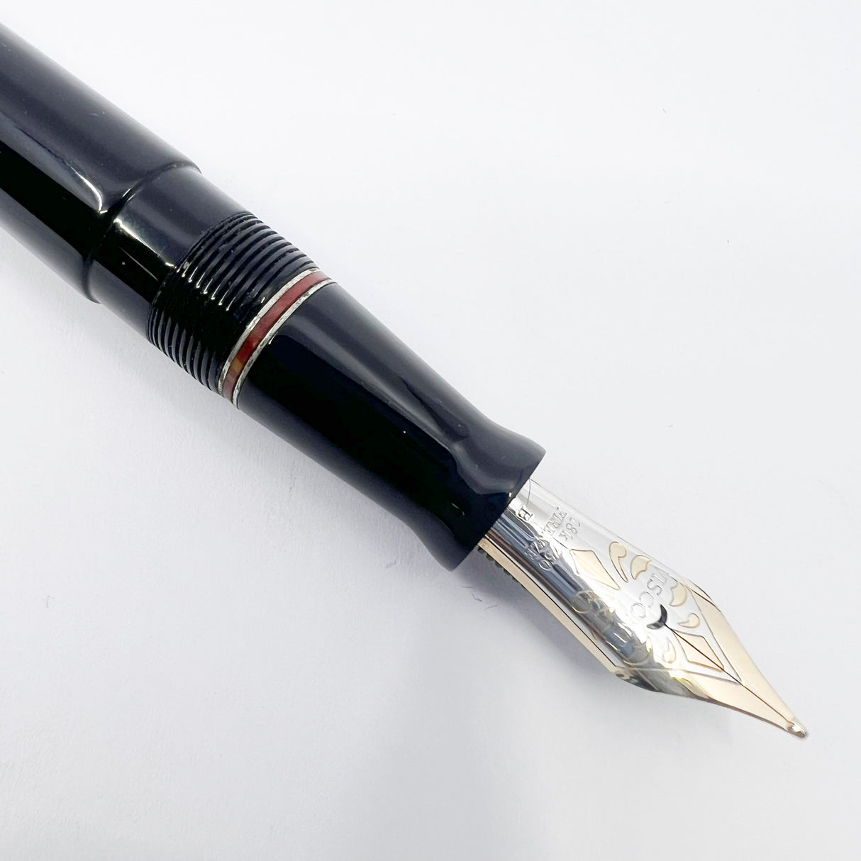 Visconti Glossy Black Resin Midnight Voyager Fountain Pen - Two Rings of Coral Celluloid - Broad 18kt Gold Nib