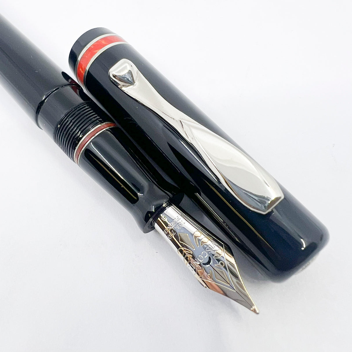 Visconti Glossy Black Resin Midnight Voyager Fountain Pen - Two Rings of Coral Celluloid - Broad 18kt Gold Nib