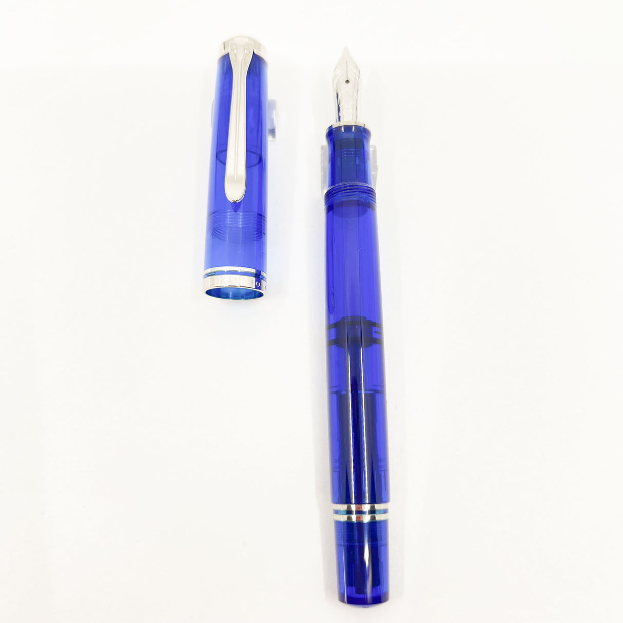 Pelikan M605 Marine Bright Blue Transparent Fountain Pen - Platinum Plated Trim