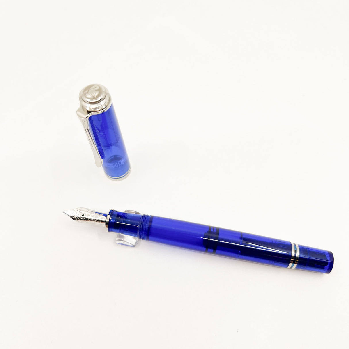 Pelikan M605 Marine Bright Blue Transparent Fountain Pen - Platinum Plated Trim