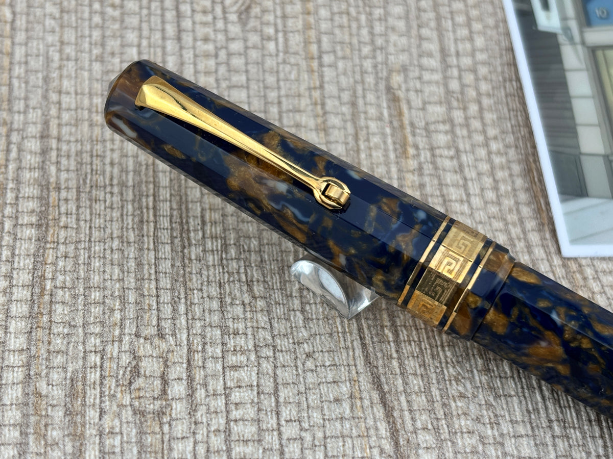 The Original Omas Paragon Celluloid Facetted Blue Saffron (aka Senappe) Mint Fountain Pen (1997) - Medium 18kt Gold Nib