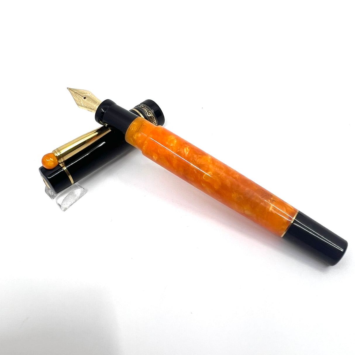 Delta Lucky Black/Orange Fountain Pen (aka WE)-  Medium 14kt Gold Nib