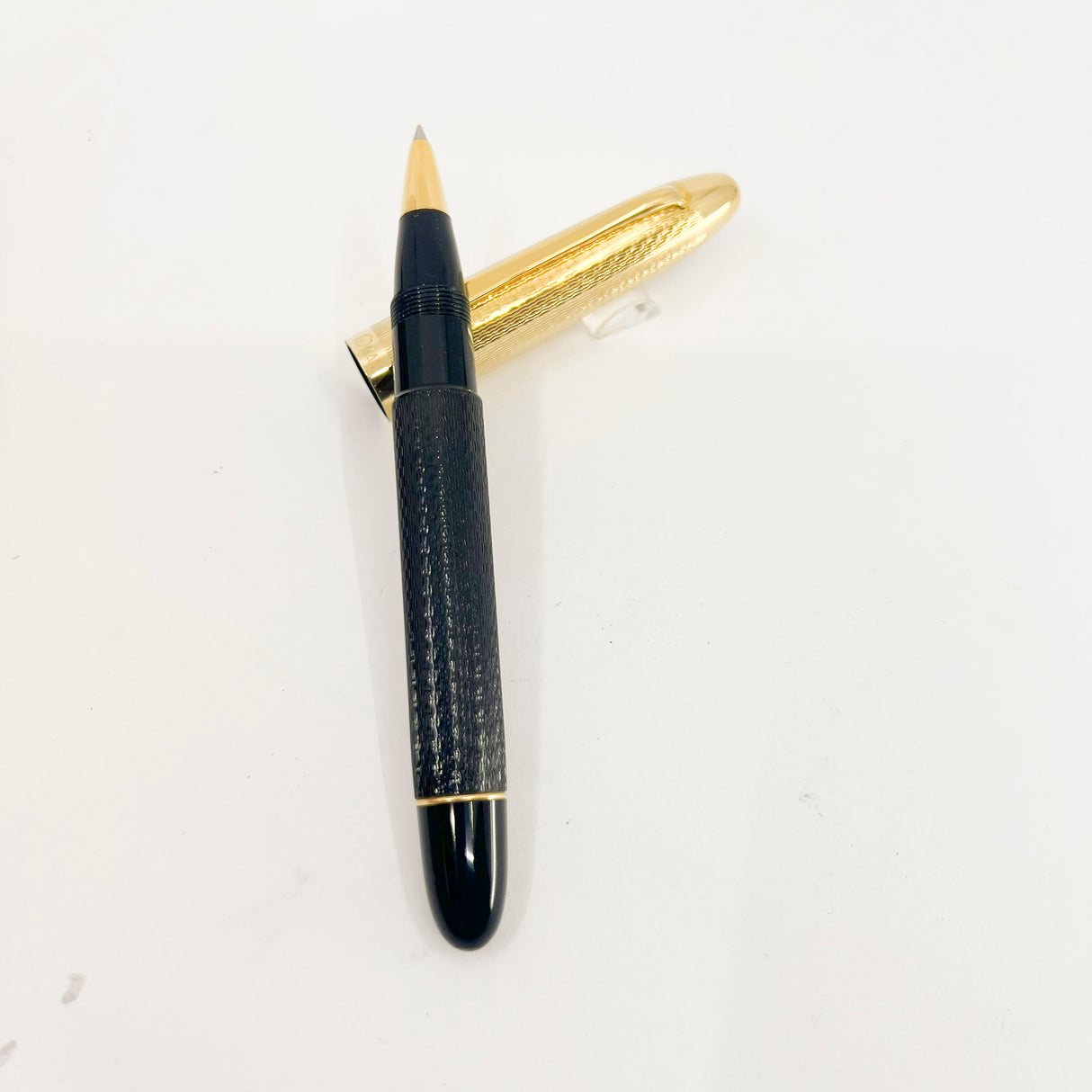 OMAS S2001 Ogiva  Rollerball - Gold Vermeil Cap & Black Guilloched Barrel