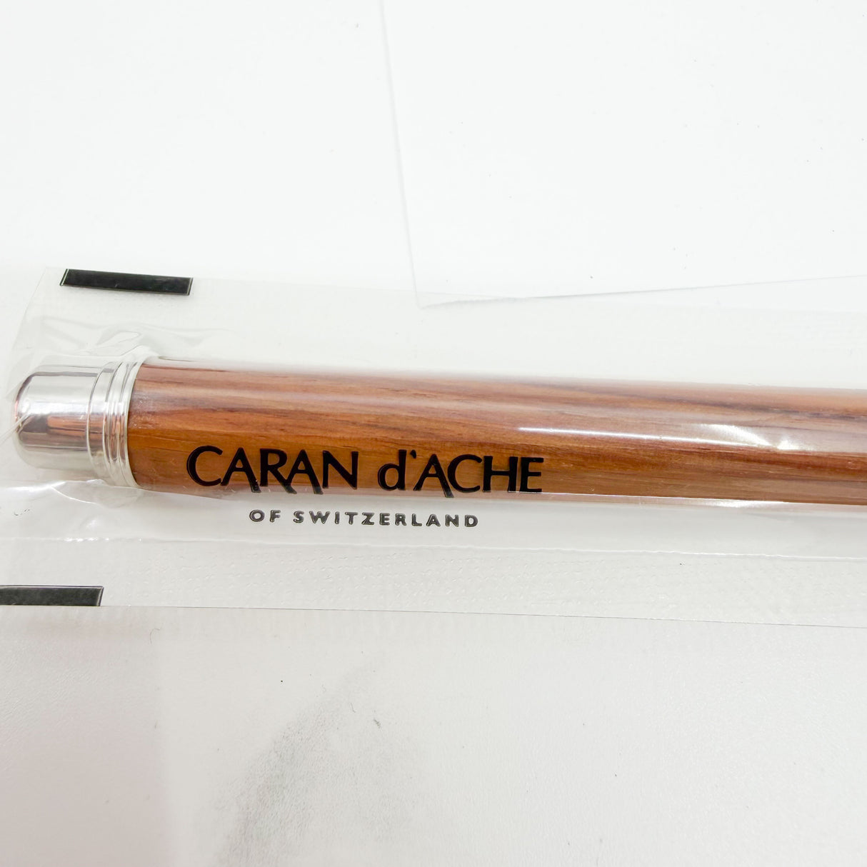 Caran D'ache Varius Metwood Fountain Pen - Rhodium Plated Cap/Brazilian Rosewood Faceted Barrel - Fine 18kt Gold Nib