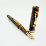 OMAS  Arte Italiana Exquisite Arco Bronze Celluloid Full Sized Paragon Milord Fountain Pen (Circa 2010) - Flexible Fine 18kt Gold Nib