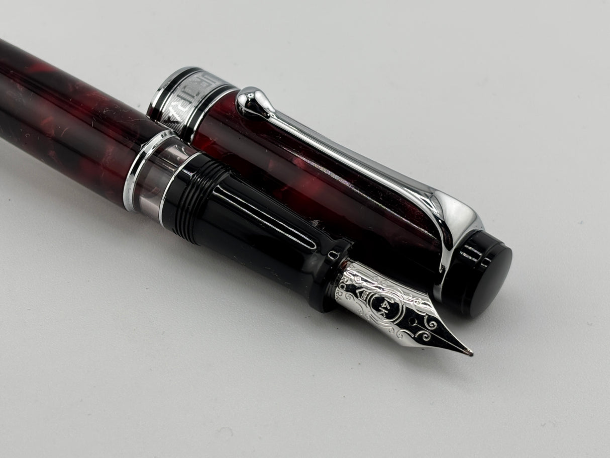 Aurora Optima  Marbled Burgundy Auroloide Fountain Pen -  Medium 14kt Gold Nib
