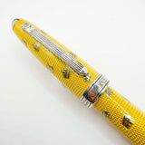 Krone Kronology Heavy Sterling Silver Oversized Rollerball -  Translucent Yellow Enamel overlaying the Guilloched Sterling Silver Body plus Scattered Crowns Engraved
