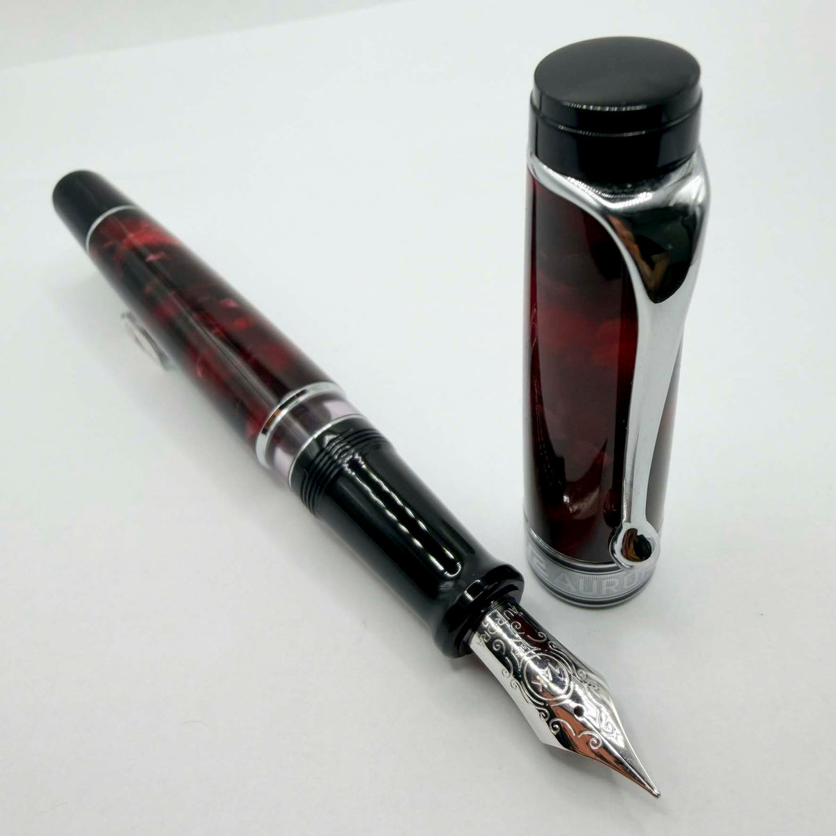Aurora Optima  Marbled Burgundy Auroloide Fountain Pen -  Fine 14kt Gold Nib