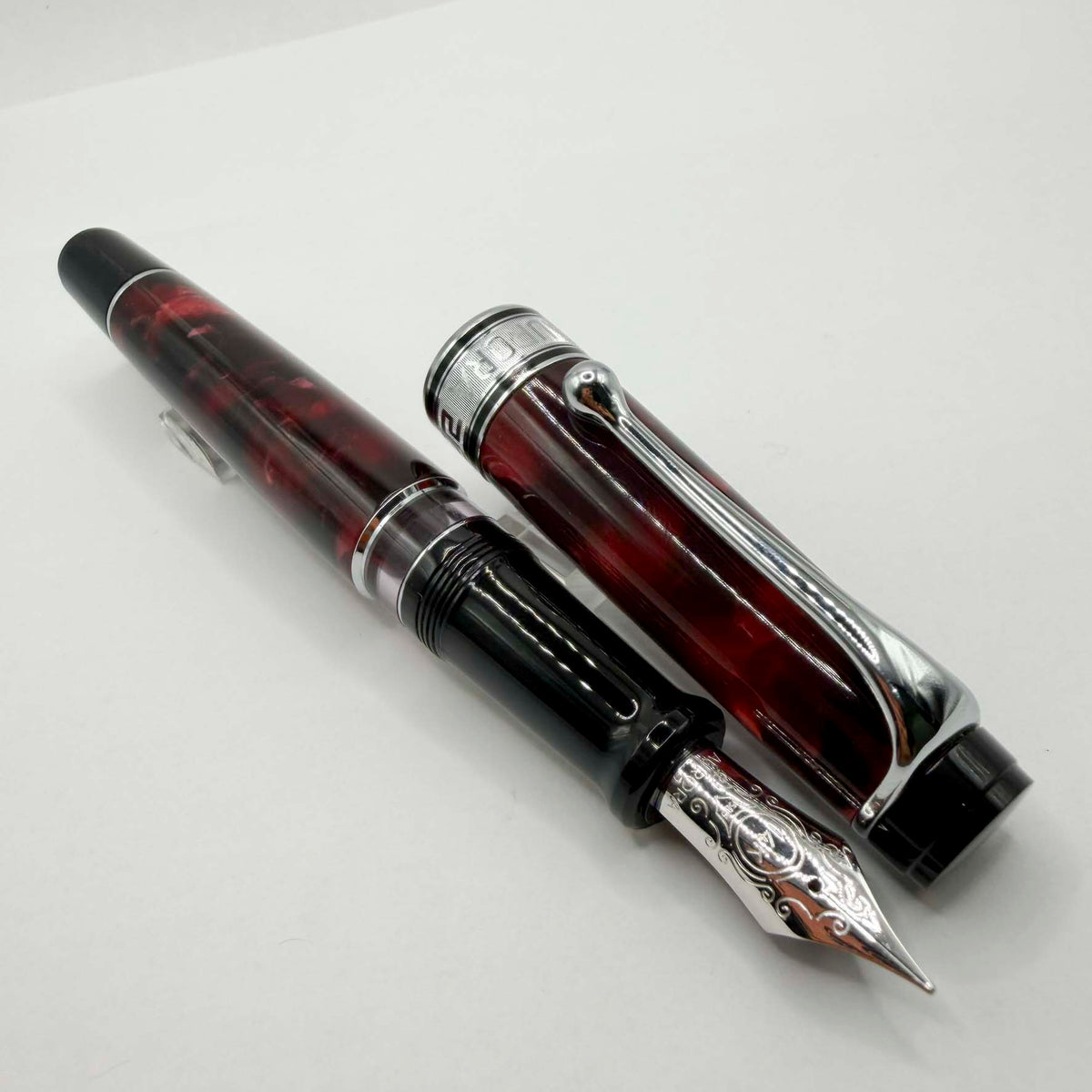 Aurora Optima  Marbled Burgundy Auroloide Fountain Pen -  Fine 14kt Gold Nib